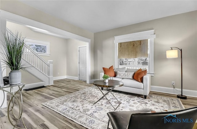58 Greenwood Ave, Toledo, OH 43605 - living room featuring wood finished floors and stairway
