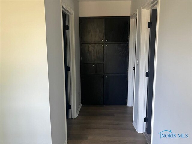611 Greenfield Dr, Maumee, OH 43537 - hallway with wood finished floors and baseboards