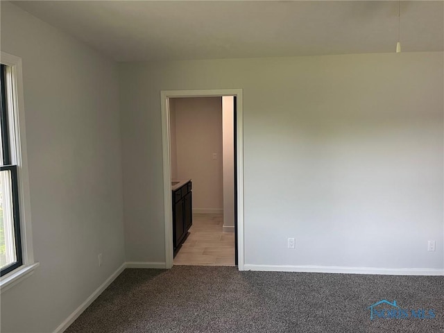 611 Greenfield Dr, Maumee, OH 43537 - empty room featuring light carpet and baseboards