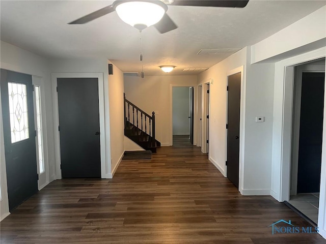 611 Greenfield Dr, Maumee, OH 43537 - entryway featuring dark wood-style floors, stairs, ceiling fan, and plenty of natural light
