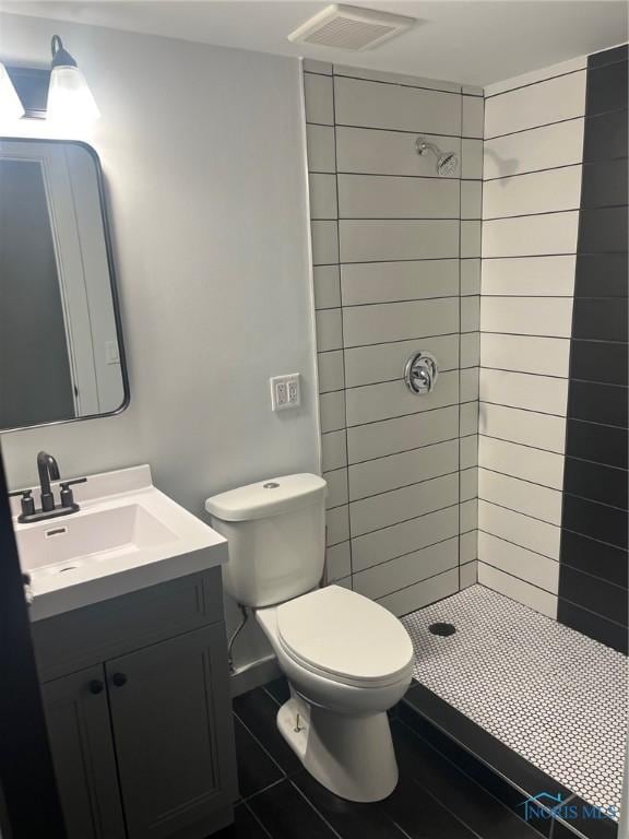 611 Greenfield Dr, Maumee, OH 43537 - bathroom with a stall shower, vanity, and tile patterned floors