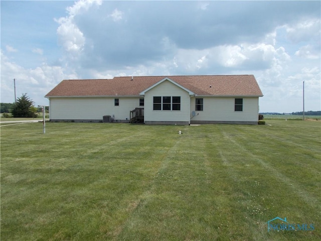 2971 County Road 12, Wauseon, OH 43567 - rear view of house featuring a lawn