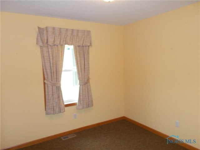 2971 County Road 12, Wauseon, OH 43567 - empty room with dark colored carpet and baseboards