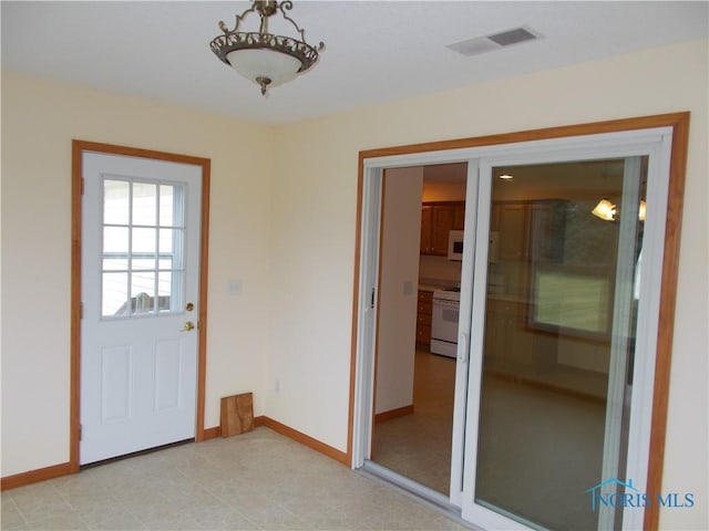 2971 County Road 12, Wauseon, OH 43567 - doorway to outside featuring baseboards