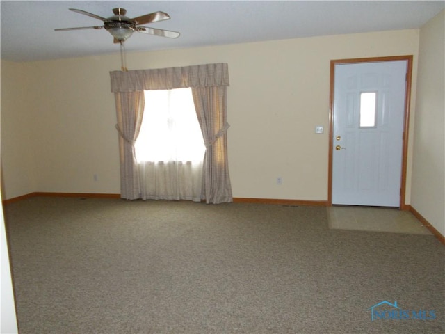 2971 County Road 12, Wauseon, OH 43567 - carpeted entryway featuring a ceiling fan and baseboards