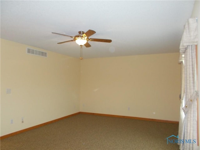 2971 County Road 12, Wauseon, OH 43567 - unfurnished room featuring light colored carpet and a ceiling fan