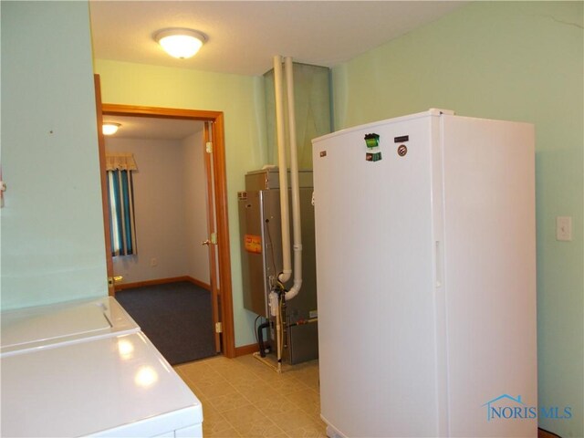 2971 County Road 12, Wauseon, OH 43567 - utility room featuring washing machine and clothes dryer
