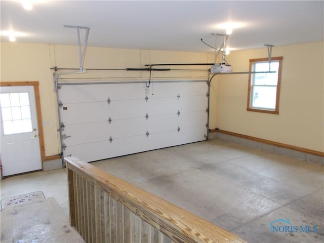 2971 County Road 12, Wauseon, OH 43567 - garage with a garage door opener and baseboards