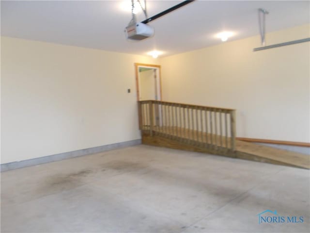 2971 County Road 12, Wauseon, OH 43567 - garage with a garage door opener and baseboards