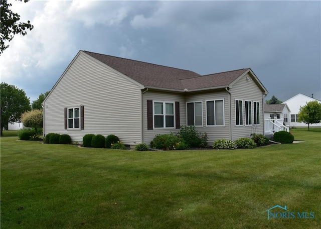4547 Harbour Creek Ct, Maumee, OH 43537 - view of home's exterior with a lawn