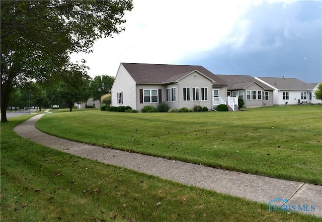 4547 Harbour Creek Ct, Maumee, OH 43537 - ranch-style house with a front lawn