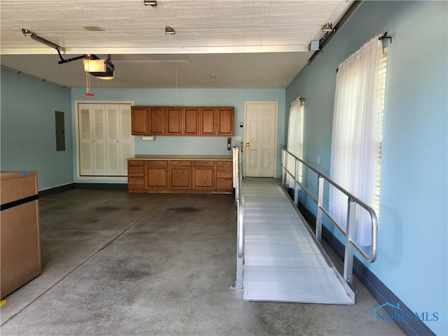 4547 Harbour Creek Ct, Maumee, OH 43537 - garage featuring a garage door opener and electric panel