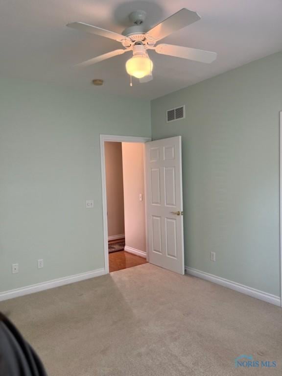 4547 Harbour Creek Ct, Maumee, OH 43537 - unfurnished bedroom with carpet floors and a ceiling fan