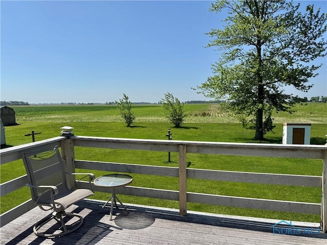 410 E Bartlow St, Deshler, OH 43516 - wooden deck with a view of countryside and a yard