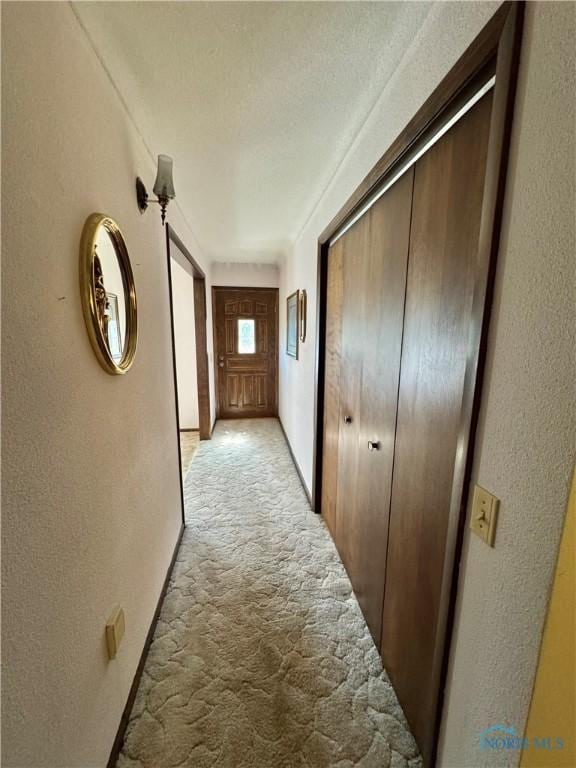 410 E Bartlow St, Deshler, OH 43516 - hall featuring light carpet and a textured wall