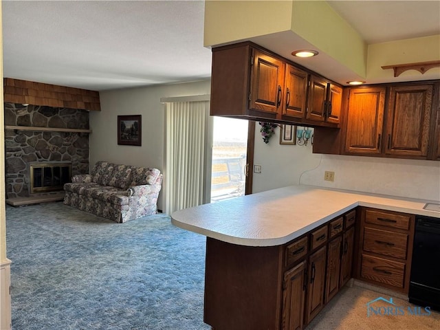410 E Bartlow St, Deshler, OH 43516 - kitchen with light countertops, a peninsula, dishwasher, open floor plan, and light colored carpet