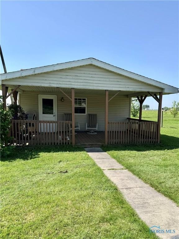 410 E Bartlow St, Deshler, OH 43516 - view of front of property with a front yard