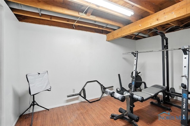 28713 Starlight Rd, Perrysburg, OH 43551 - exercise room featuring wood finished floors and baseboards