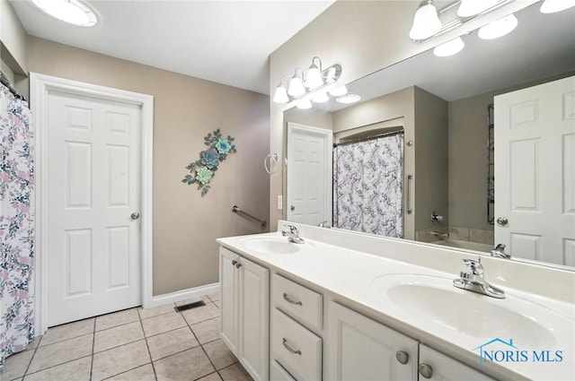 41 Shenandoah Cir, Sylvania, OH 43560 - full bathroom featuring double vanity, tile patterned floors, and a shower with curtain