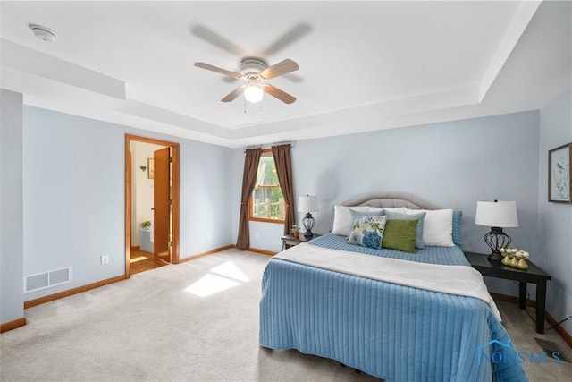 14691 Ramblehurst Dr, Perrysburg, OH 43551 - bedroom featuring a raised ceiling, carpet flooring, and ceiling fan