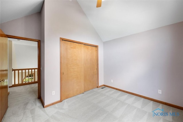 14691 Ramblehurst Dr, Perrysburg, OH 43551 - unfurnished bedroom featuring lofted ceiling, light carpet, a closet, and a ceiling fan