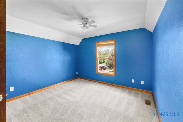 14691 Ramblehurst Dr, Perrysburg, OH 43551 - additional living space featuring lofted ceiling, a ceiling fan, and carpet