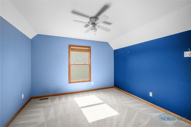 14691 Ramblehurst Dr, Perrysburg, OH 43551 - additional living space with vaulted ceiling, ceiling fan, and carpet flooring