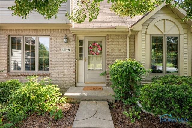 14691 Ramblehurst Dr, Perrysburg, OH 43551 - doorway to property featuring brick siding