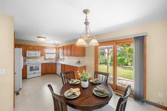 14691 Ramblehurst Dr, Perrysburg, OH 43551 - dining area with a chandelier