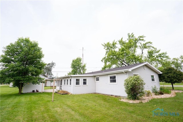 317 E Rosewood Ave, Defiance, OH 43512 - back of property featuring a yard