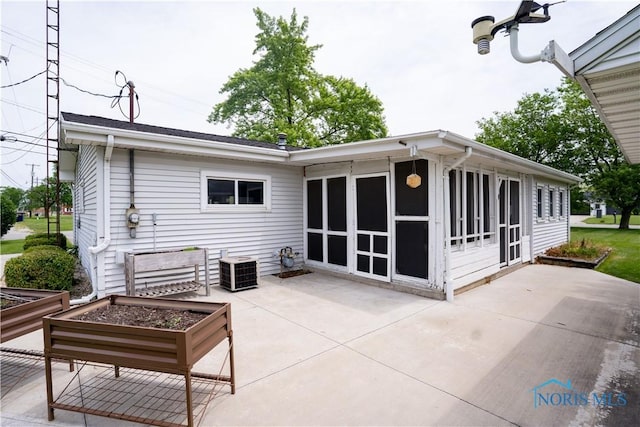 317 E Rosewood Ave, Defiance, OH 43512 - back of house featuring a patio area