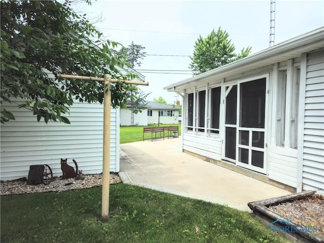 317 E Rosewood Ave, Defiance, OH 43512 - view of patio / terrace with a sunroom