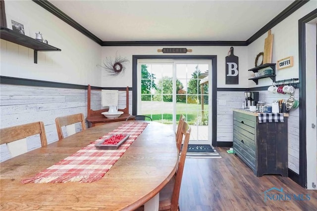 10549 Cygnet Rd, Cygnet, OH 43413 - dining space featuring crown molding, dark wood-style floors, and wooden walls