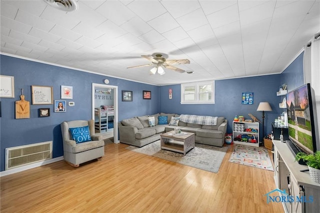 411 Seneca St, Defiance, OH 43512 - living room with light wood-style floors and a ceiling fan