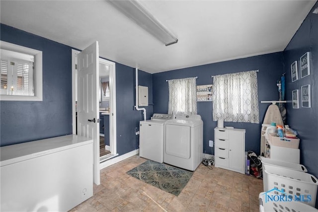 411 Seneca St, Defiance, OH 43512 - washroom with separate washer and dryer and stone finish floors