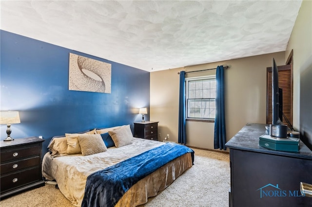 807 S Jefferson St, Pandora, OH 45877 - bedroom featuring light colored carpet and a textured ceiling