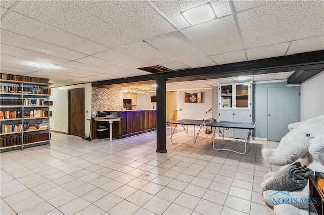 807 S Jefferson St, Pandora, OH 45877 - finished basement with a drop ceiling and light tile patterned flooring