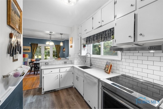 3418 Kirkwall Rd, Toledo, OH 43606 - kitchen featuring dishwasher, stainless steel electric range oven, healthy amount of natural light, white cabinetry, and crown molding
