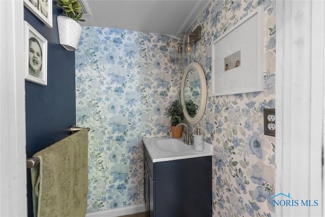 3418 Kirkwall Rd, Toledo, OH 43606 - bathroom featuring wallpapered walls and vanity