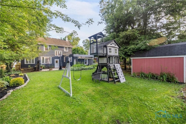 3418 Kirkwall Rd, Toledo, OH 43606 - view of play area featuring a yard and a storage unit