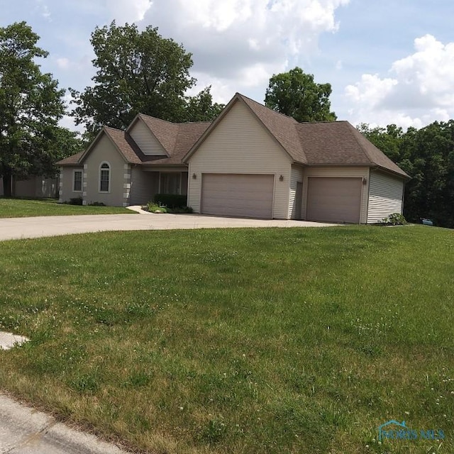 1623 Evan Dr, Defiance, OH 43512 - ranch-style house with an attached garage, a front lawn, and driveway