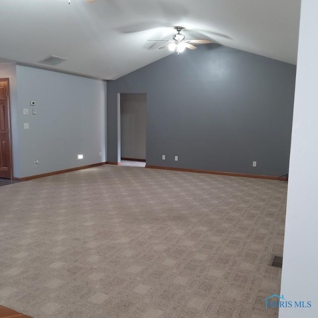1623 Evan Dr, Defiance, OH 43512 - unfurnished room featuring a ceiling fan, vaulted ceiling, and light carpet