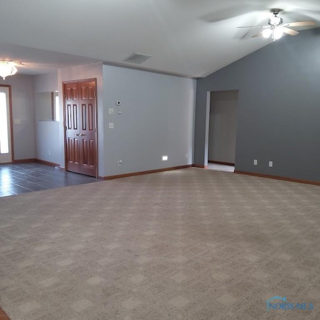 1623 Evan Dr, Defiance, OH 43512 - spare room featuring carpet flooring, vaulted ceiling, and ceiling fan