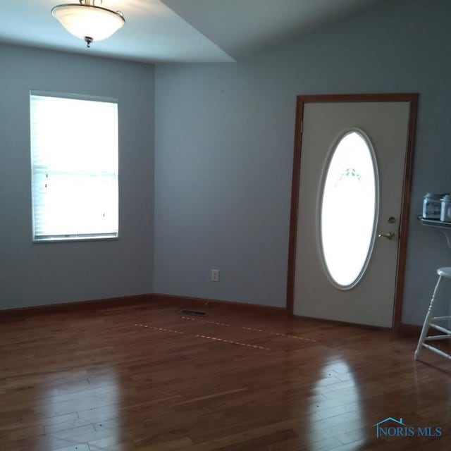 1623 Evan Dr, Defiance, OH 43512 - foyer with hardwood / wood-style floors and vaulted ceiling
