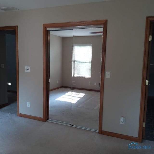 1623 Evan Dr, Defiance, OH 43512 - unfurnished bedroom with carpet flooring and a closet