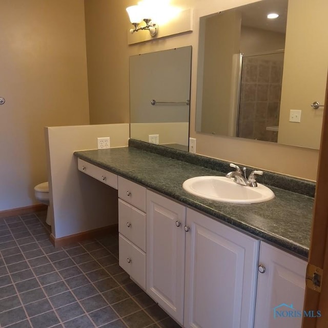 1623 Evan Dr, Defiance, OH 43512 - bathroom with tile patterned floors, vanity, a shower with shower door, and recessed lighting