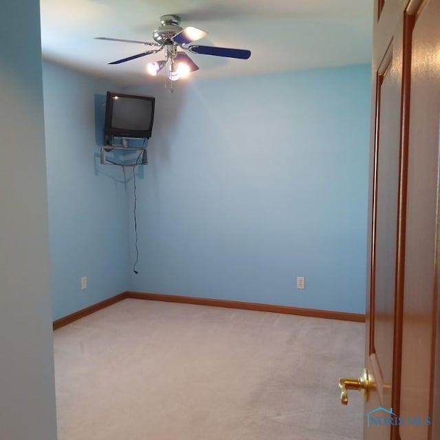 1623 Evan Dr, Defiance, OH 43512 - spare room with ceiling fan and light carpet