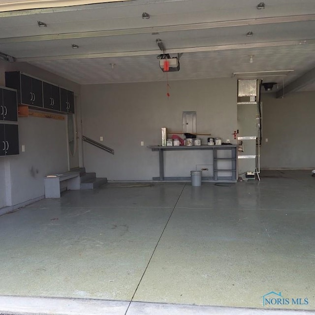 1623 Evan Dr, Defiance, OH 43512 - garage featuring a garage door opener
