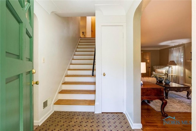 4146 Northmoor Rd, Ottawa Hills, OH 43606 - stairway with arched walkways and tile patterned floors
