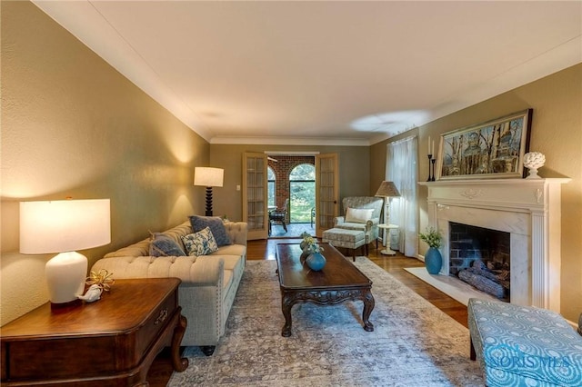 4146 Northmoor Rd, Ottawa Hills, OH 43606 - living area with wood finished floors, a premium fireplace, and crown molding